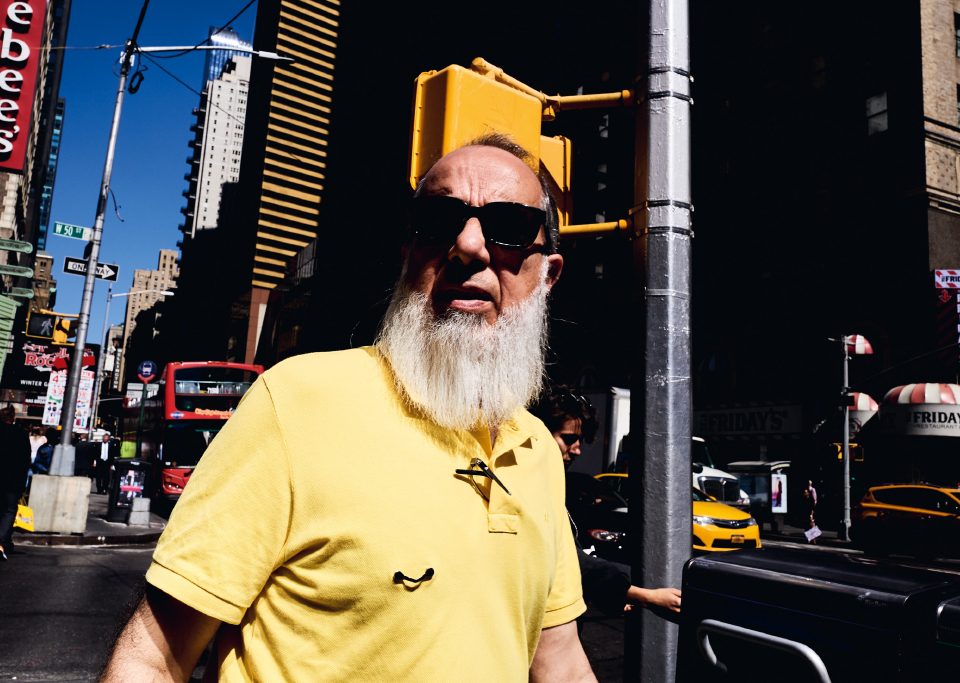 bearded guy with sunglasses and yellow polo Tomaso Baldessarini