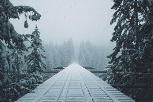 train tracks into snow