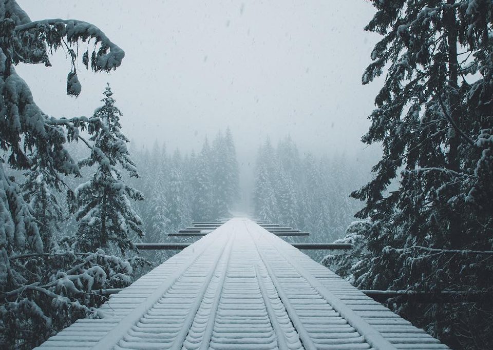 train tracks into snow