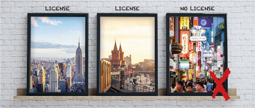 3 framed photos against a brick wall one without license