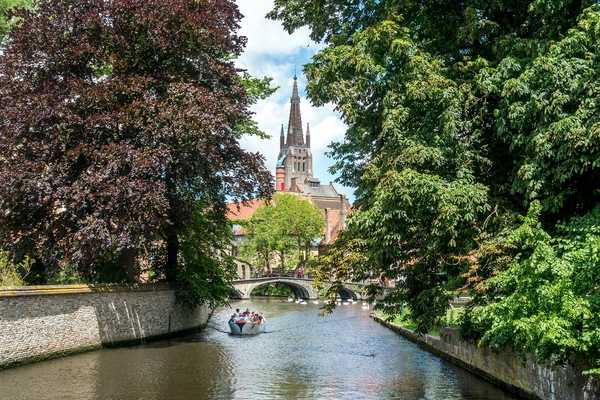 bridge and boat in Bruges Belgium