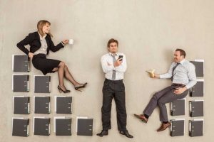 office people fake sitting on folders