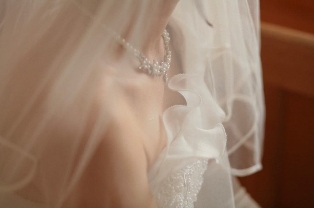 close up bridal jewellery on neck