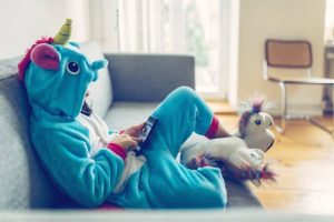 Blue unicorn onepiece playing phone