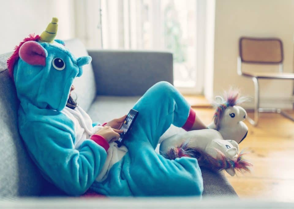 Blue unicorn onepiece playing phone