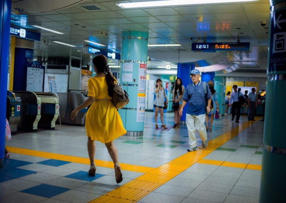 Lukasz Palka Tokyo Metro woman in yellow dress