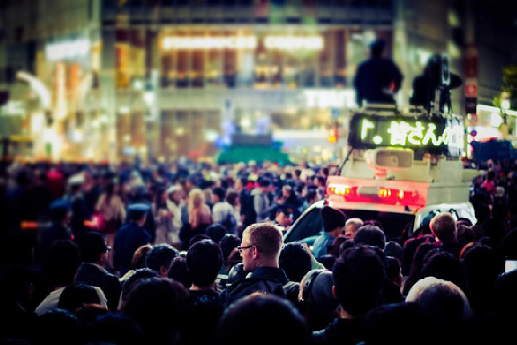 Scramble crossing in front of Shibuya Station in Tokyo