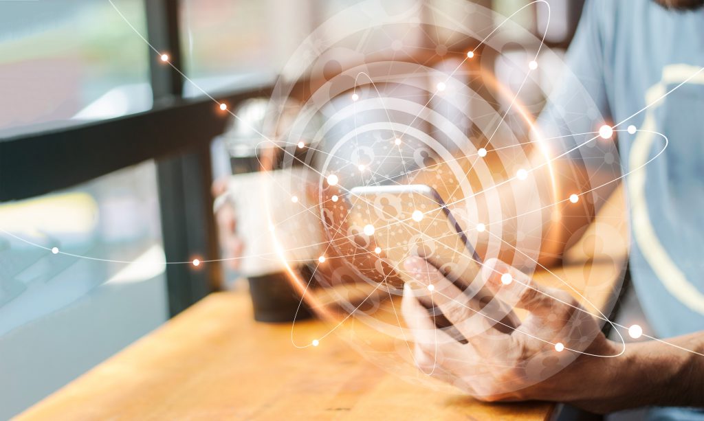 Man Using Mobile Global Network Connection On Social Media Virtual Screen. Digital Technology And Networking.