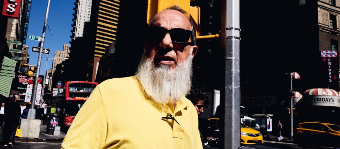 bearded guy with sunglasses and yellow polo Tomaso Baldessarini