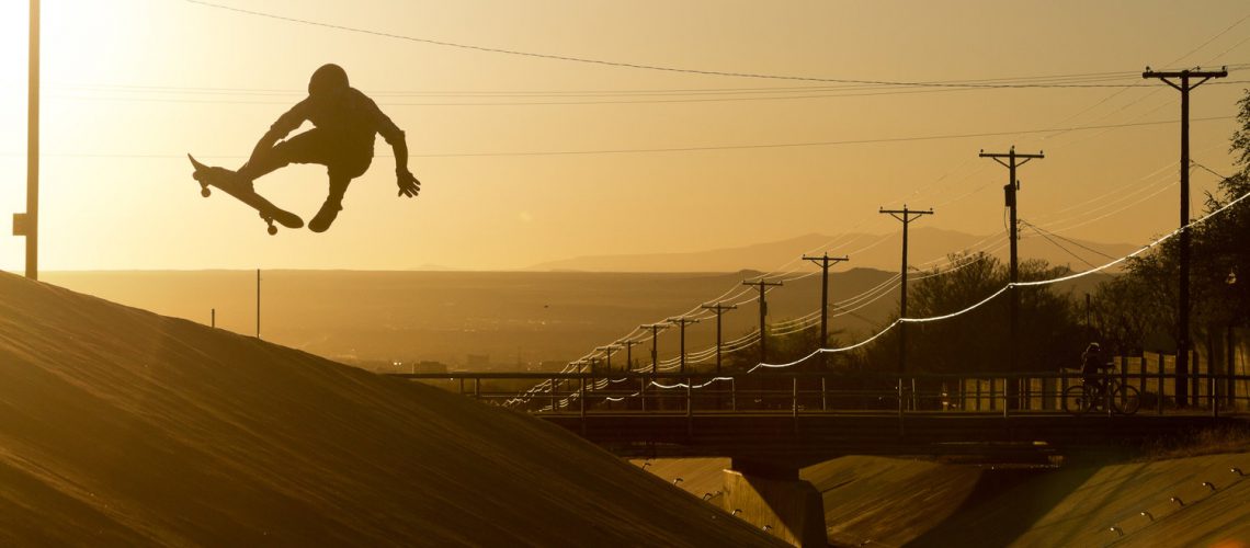 Skateboarder jump in air photo Max Dubler